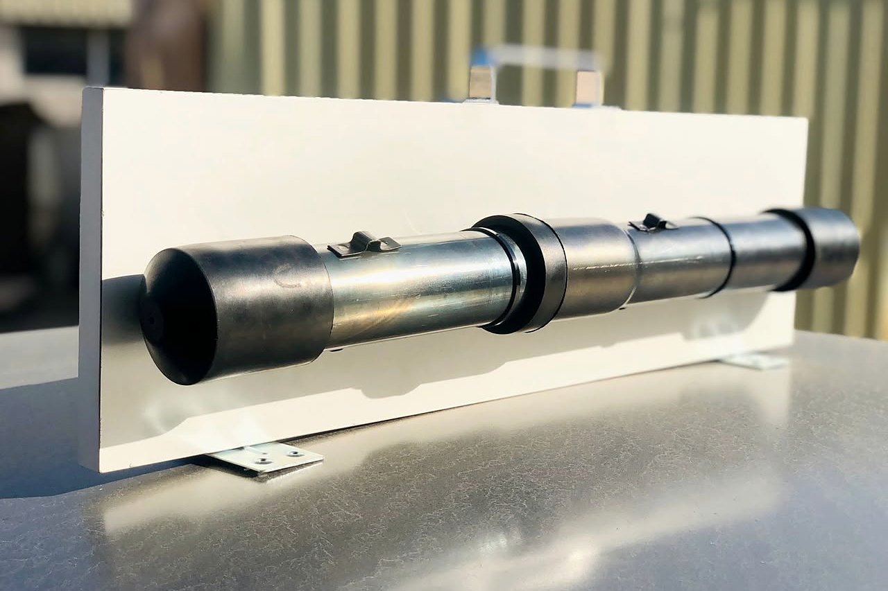 Sonic logging tube with push-fit joint and rubber end caps